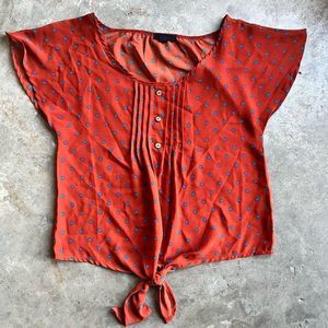 Mine size small burnt orange polka dot blouse